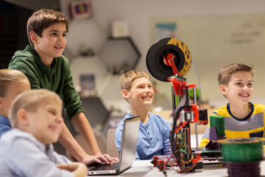 Students using a robot in the classroom