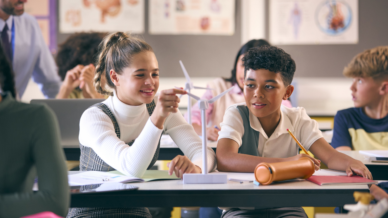 Secondary school students with wind turbine