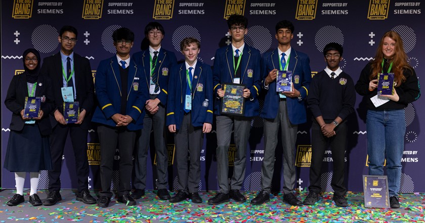 School students on stage with confetti - The Big Bang Competition winners 2024