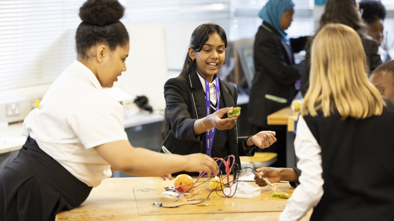 Girls working in a team doing an Energy Quest experiment