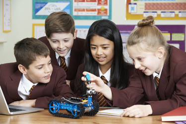 Secondary school students building robot