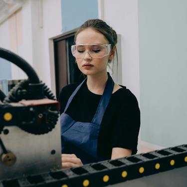 An engineer works with machinery 