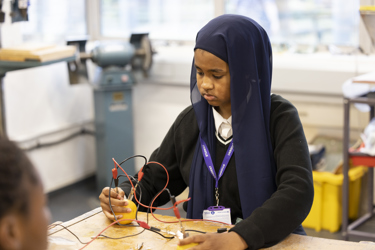 Girl doing an Energy Quest experiment