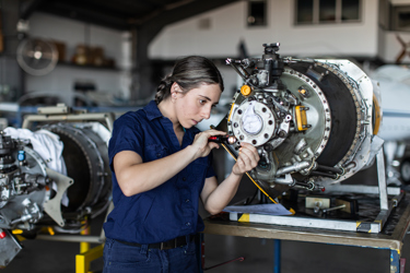 Engineer working on engine