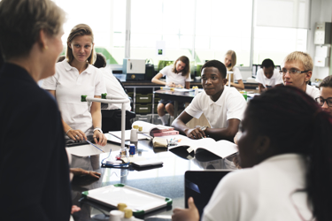 Secondary school students in science lab