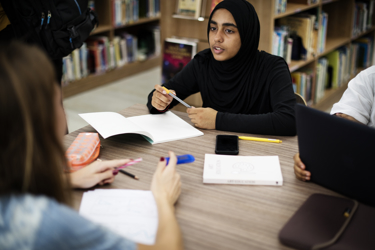 Secondary school student in library