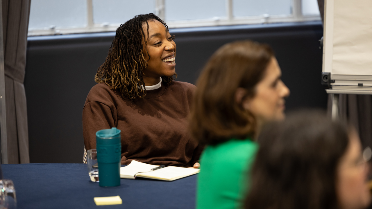 A smiling delegate at Tomorrow's Engineers Live