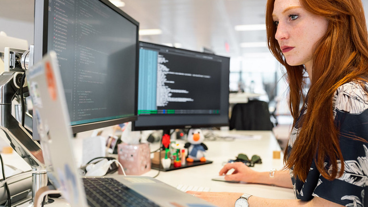 A person at their desk working